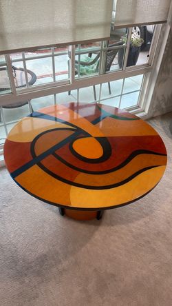 Round Dining Table with Abstract Inlay Design