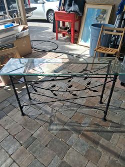 Entrance table metal base glass top