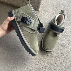 Green suede UGG boots with straps