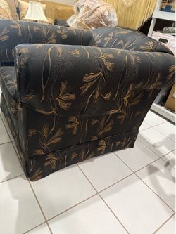 Two Vintage black upholstered armchair with gold floral pattern