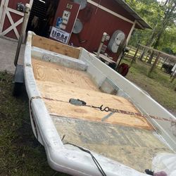 14 foot game fisher skiff, 30 hp two stroke tattoo on the back