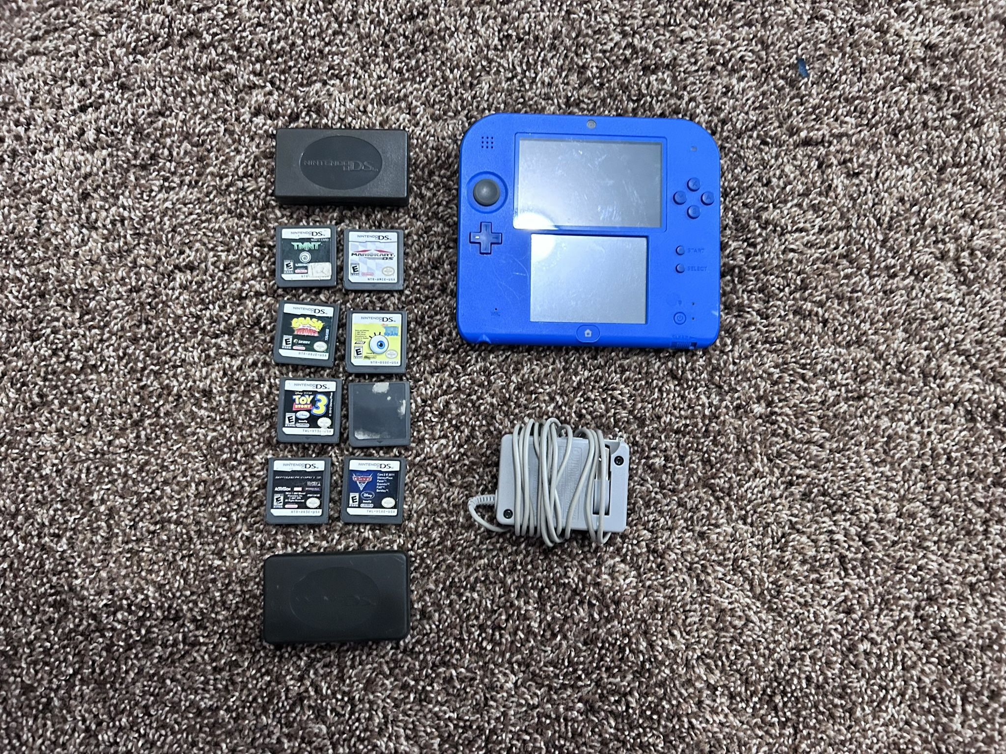 Blue Nintendo 2DS + 8 Games