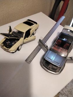 Two Mustangs 1969 Mach 1 and Mustang GT