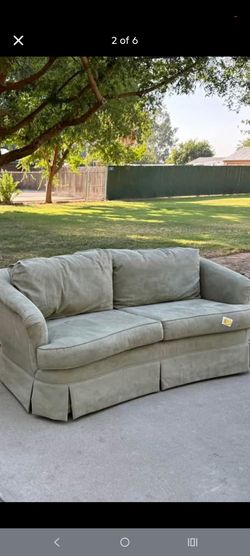 Nice olive green loveseat couch