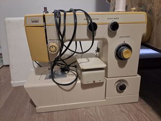 Sewing machine with case