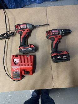 ‏ Milwaukee impact and drill set
