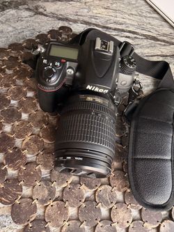 Nikon D7000 camera with 2 lenses