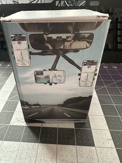 Rearview mirror phone holder