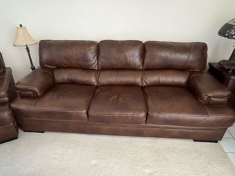 Brown leather full length couch