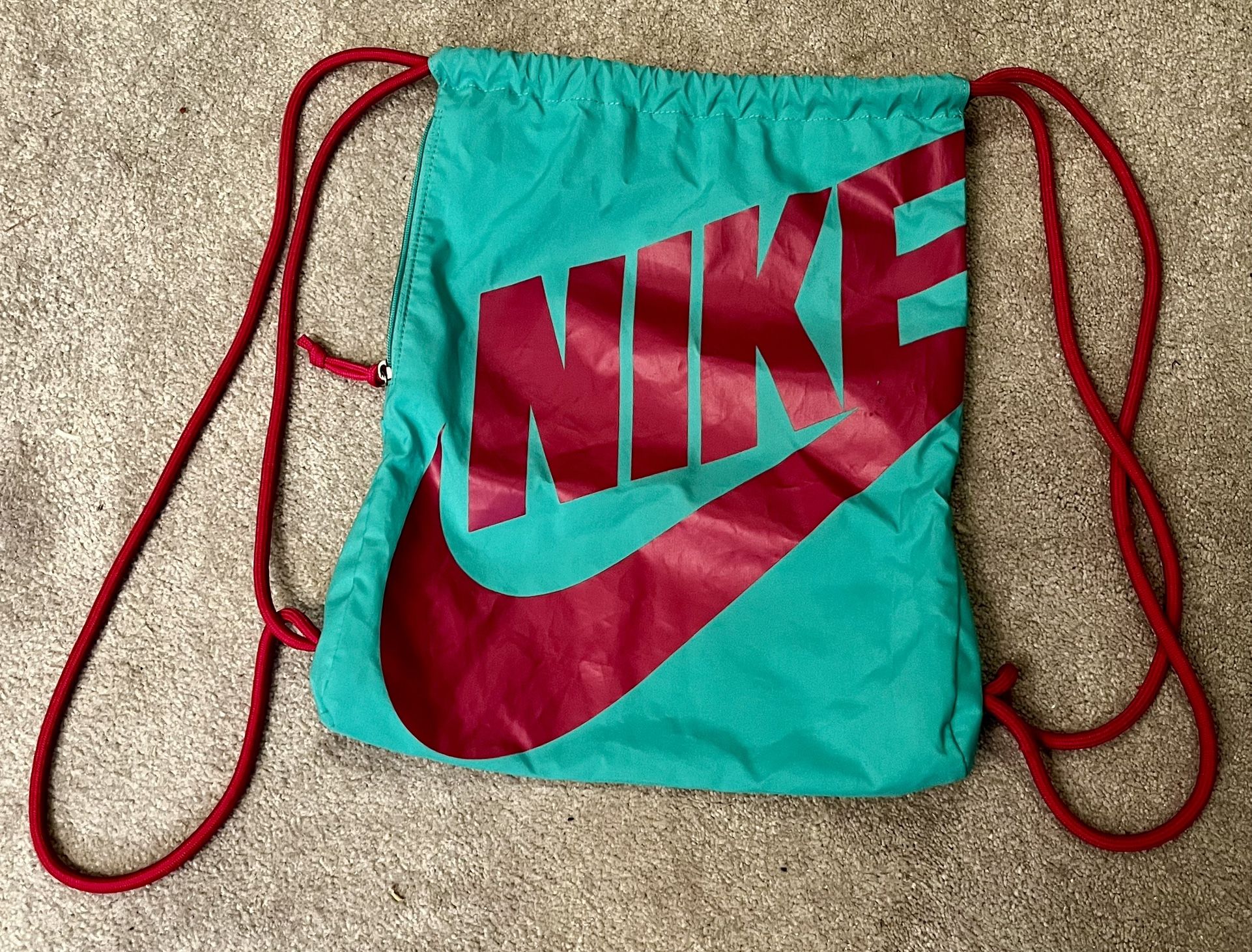 Nike graphic drawstring gym bag with side pocket