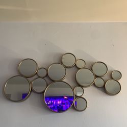 Wall mirror And Glass Bowls For The Table 