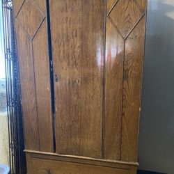 VINTAGE OAK ARMOIR, NEEDS TLC. MIRROR IS IN PERFECT CONDITION, BRASS HARDWARE