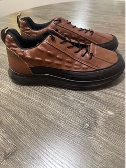 Brand New Never Worn *Brown/ Rim Slip Ons.