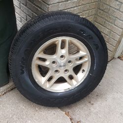 1 JEEP GRAND CHEROKEE GRAND LORADO RIM AND TIRE