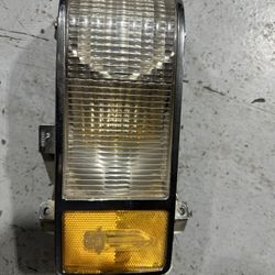 Cadillac LH Turn Signal Housing with Chrome Bezel