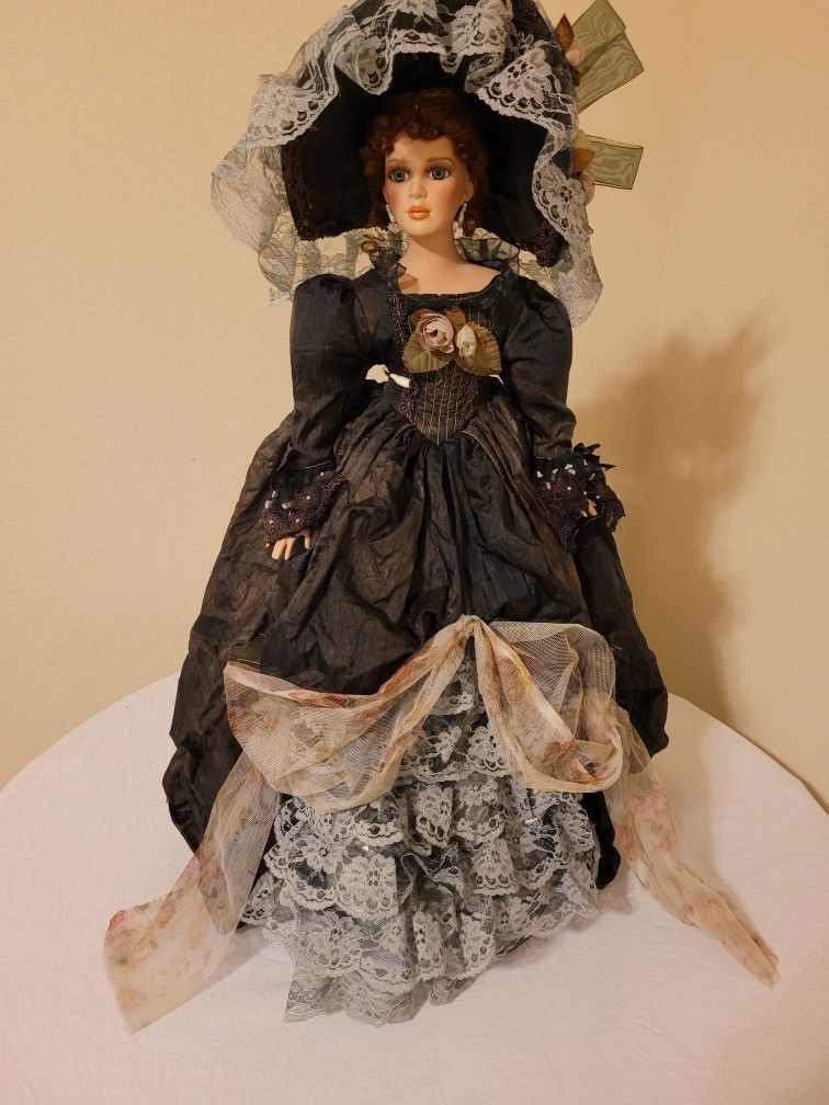 Haunted Musical Porcelain Doll