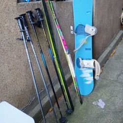 Winter Sports. Snowboard Or Ski Poles Or Children's Cross Country Skis