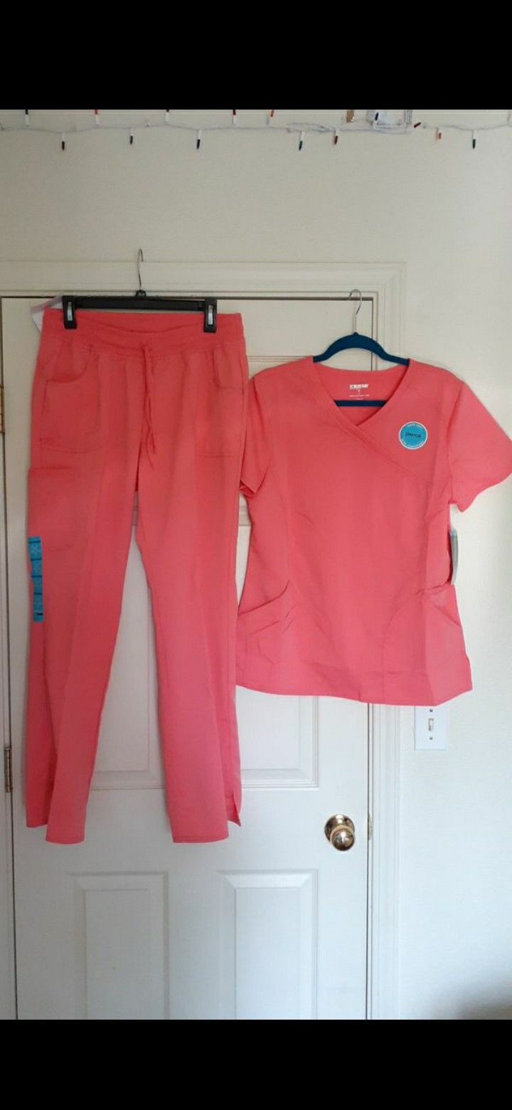BRAND NEW SCRUBS. PEACH COLOR