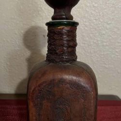 One Vintage Glass & Leather Empty Bottle with Hand Made Decorative Design