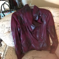 Small burgundy leather jacket faux