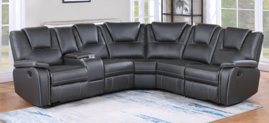 GREY MANUAL RECLINE SECTIONAL. WE FINANCE