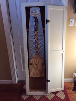 Vintage Ironing Board in Cabinet