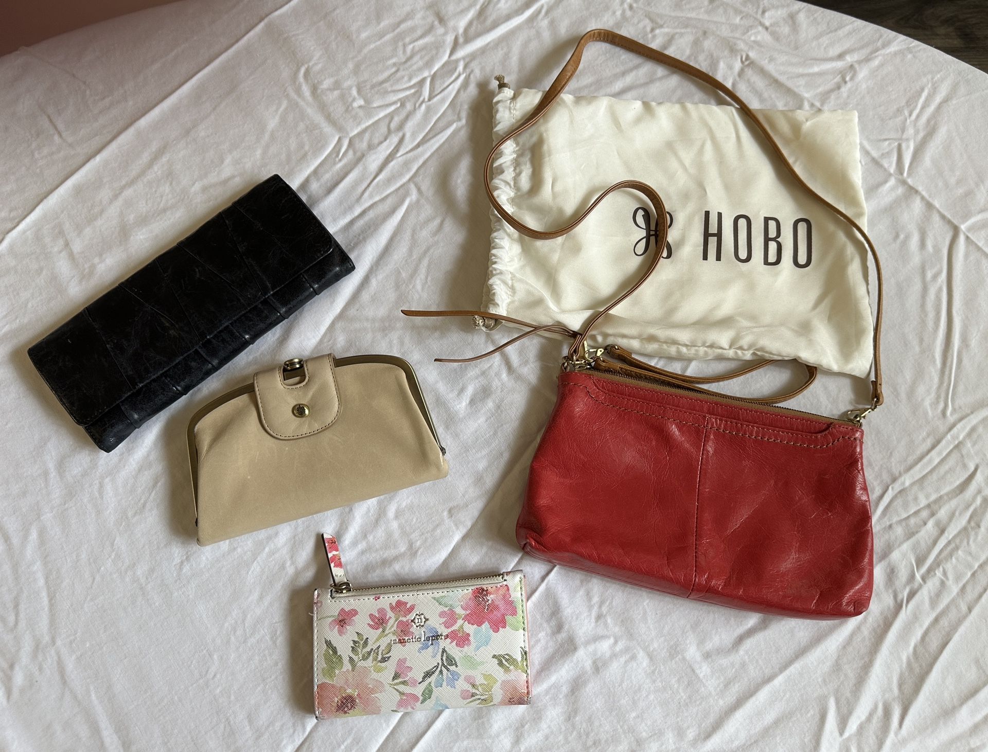 Variety Of Wallets And One Handbag