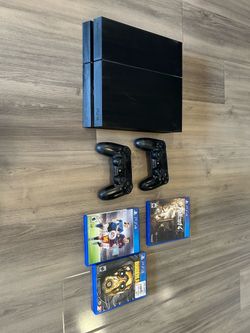 PlayStation 4 + Two Controllers