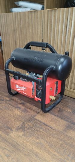 M18 FUEL 18-Volt Lithium-Ion Cordless 2 Gal. Compact Electric Quiet Air Compressor (Tool-Only) like new used once just collecting dust here