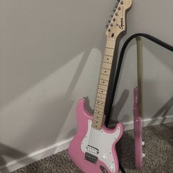 Pink electric guitar