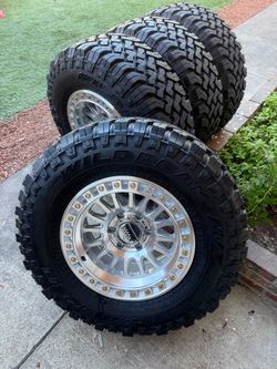 Kmc 552 wheels Chevy Silverado like new tires
