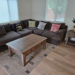 Brown Sectional Couch With Coffee Table And Side Table 