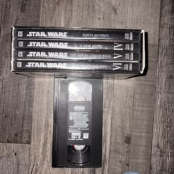 StarWars Episode 1 On VHS And The StarWars Trilogy DVD Set Including 4 DVDs 
