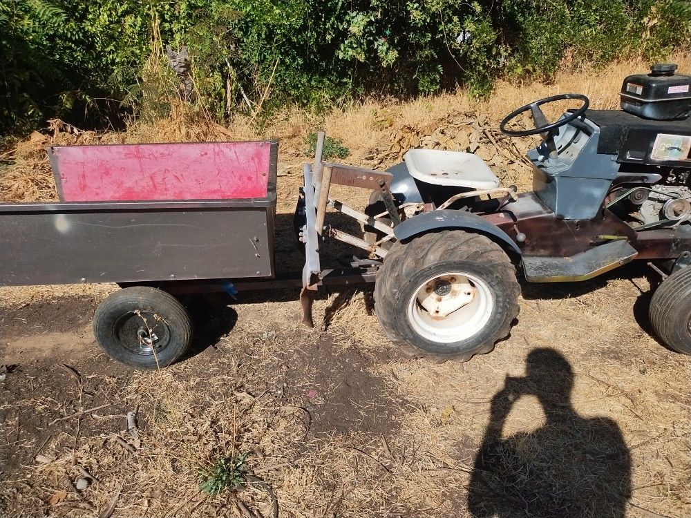 Garden Tractor With Scrapper And Rippers 
