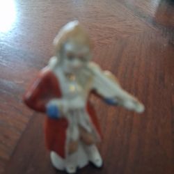 vintage porcelain figurine likely made in Occupied Japan. 