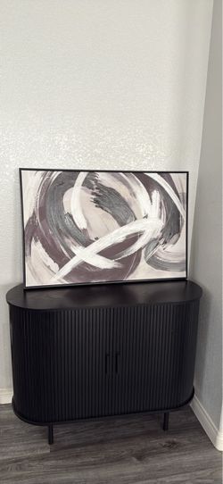 Black and white framed canvas painting
