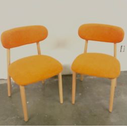 Pair of Orange mid-century, Modern style Dinning Chairs
