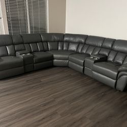 New Reclining Sectional.  Grey Or Ink Blue Gel Leatherette.  123” X 123”.  Free Delivery!