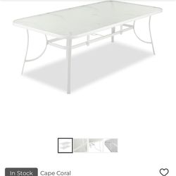 Cape Coral Aluminum And Glass Top Dining Table for outside and great condition , dominoes is on the pictures 