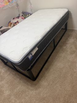 Twin size mattress with frame