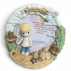 "Footprints in the Sand" collector's plate from the Precious Moments "Walking in Faith" collection. 