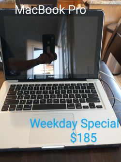 MacBook Pro with Extended Wall Charger