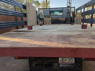 Steel platform with plywood cut out and in place for build of a shed or  tiny home