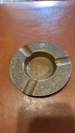 Vintage engraved brass ashtray