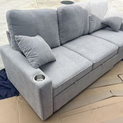 New Couch W Pullout Bed / Chaise Storage.  Grey.  82x33Dx32.  Free Delivery!