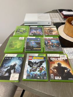 Xbox One S gaming system with 1 controller and 9 video games
