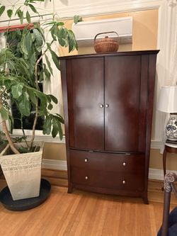 Armoire - wardrobe or media storage