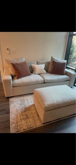 Raymour & Flanigan Cream Sofa + Ottoman – Feather Cushions