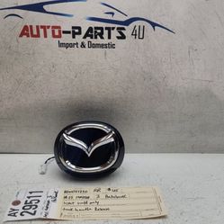 2019 - 2020 - 2021 - 2023 MAZDA 3 REAR DOOR HANDLE RELEASE TAILGATE EMBLEM OEM AY29511