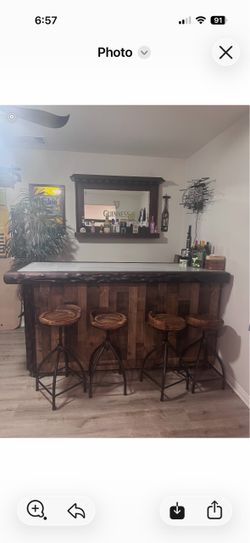 Bar and bar stools . Mirror included